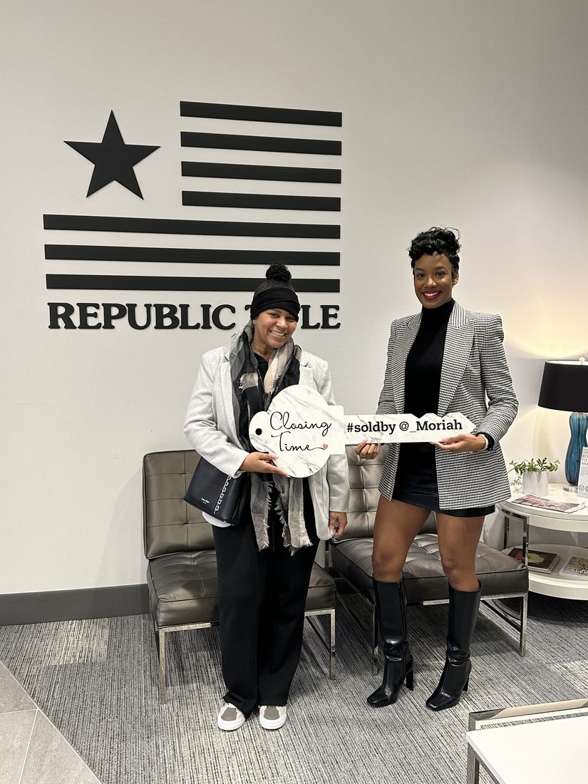 Diversify Real Estate Group clients celebrating a closing at Republic Title