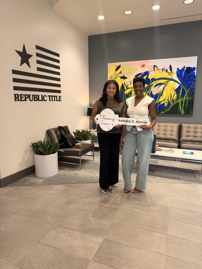 Diversify Real Estate Group clients celebrating a closing at Republic Title